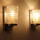 Wall lamps in worked glass and chromed metal, Italy 70's