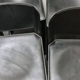 Un ensemble de quatre tabourets de bar italiens en cuir par Matteo Grassi