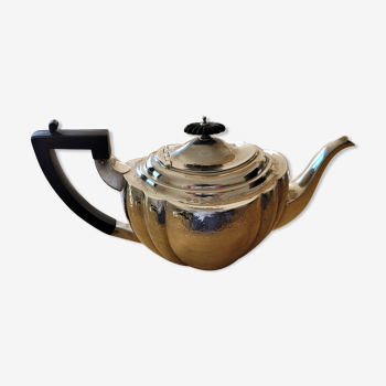 Chiseled silver teapot