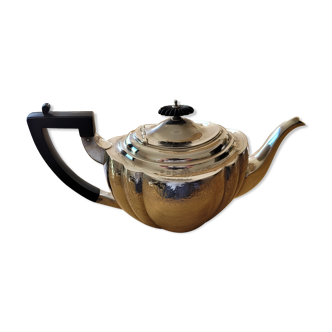 Chiseled silver teapot