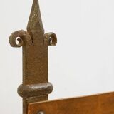 Curule armchair in wrought iron and leather