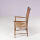 1930s small low spindle-back hearth chair / side chair with wicker seat, Arts & Craft Movement, Morris & Co for Liberty and Co, Stowaway London