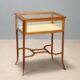Showcase table in mahogany with bevelled glass.
