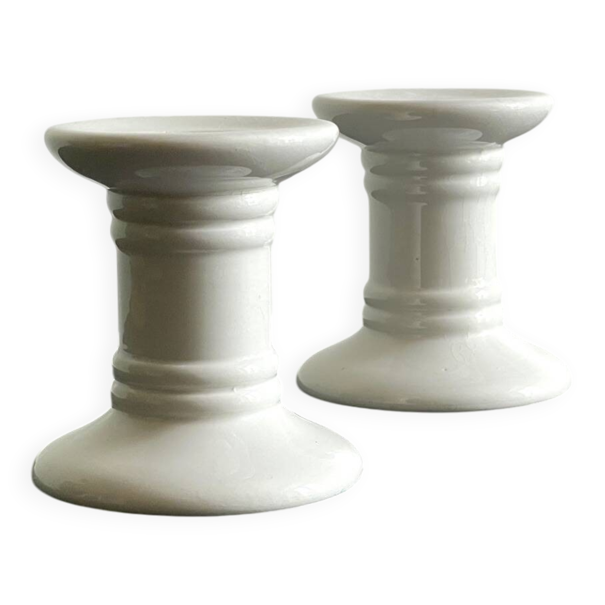 Pair of White Ceramic Candlesticks