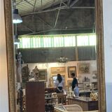 Fireplace mirror - varnished wood and gilded stucco with palmette decoration