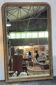 Miroir de cheminée - bois vernis et stuc doré à décor de palmettes