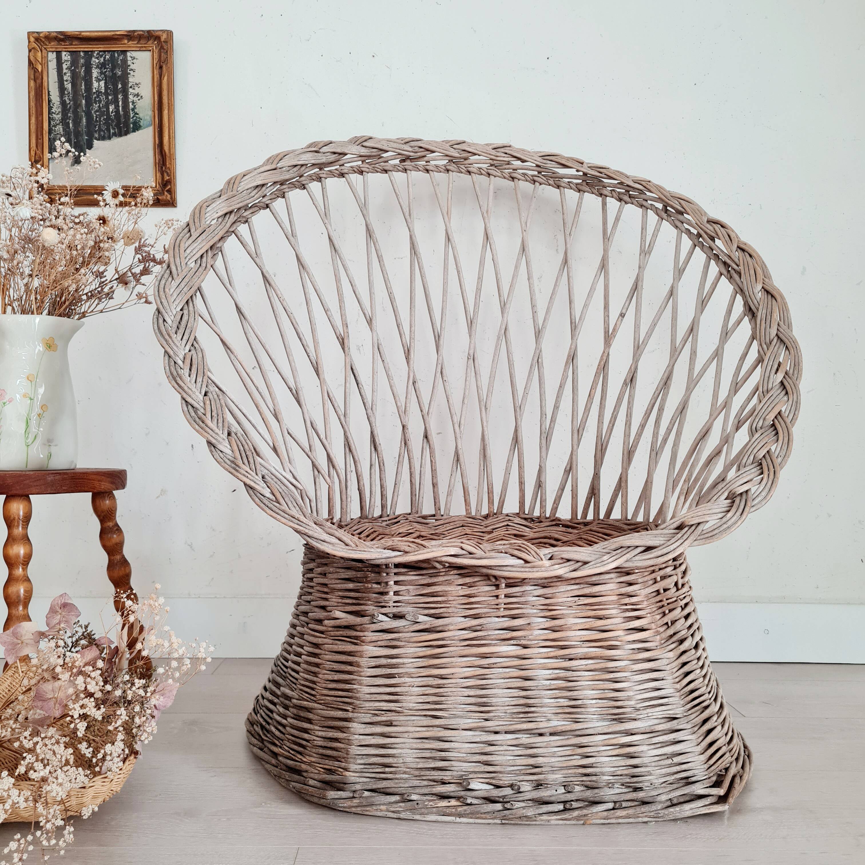 Antique armchair in gray woven wicker