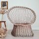 Antique armchair in gray woven wicker