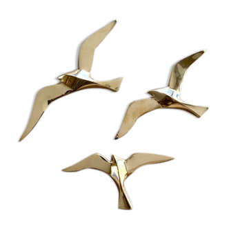 Series of 3 golden brass seagulls to hang