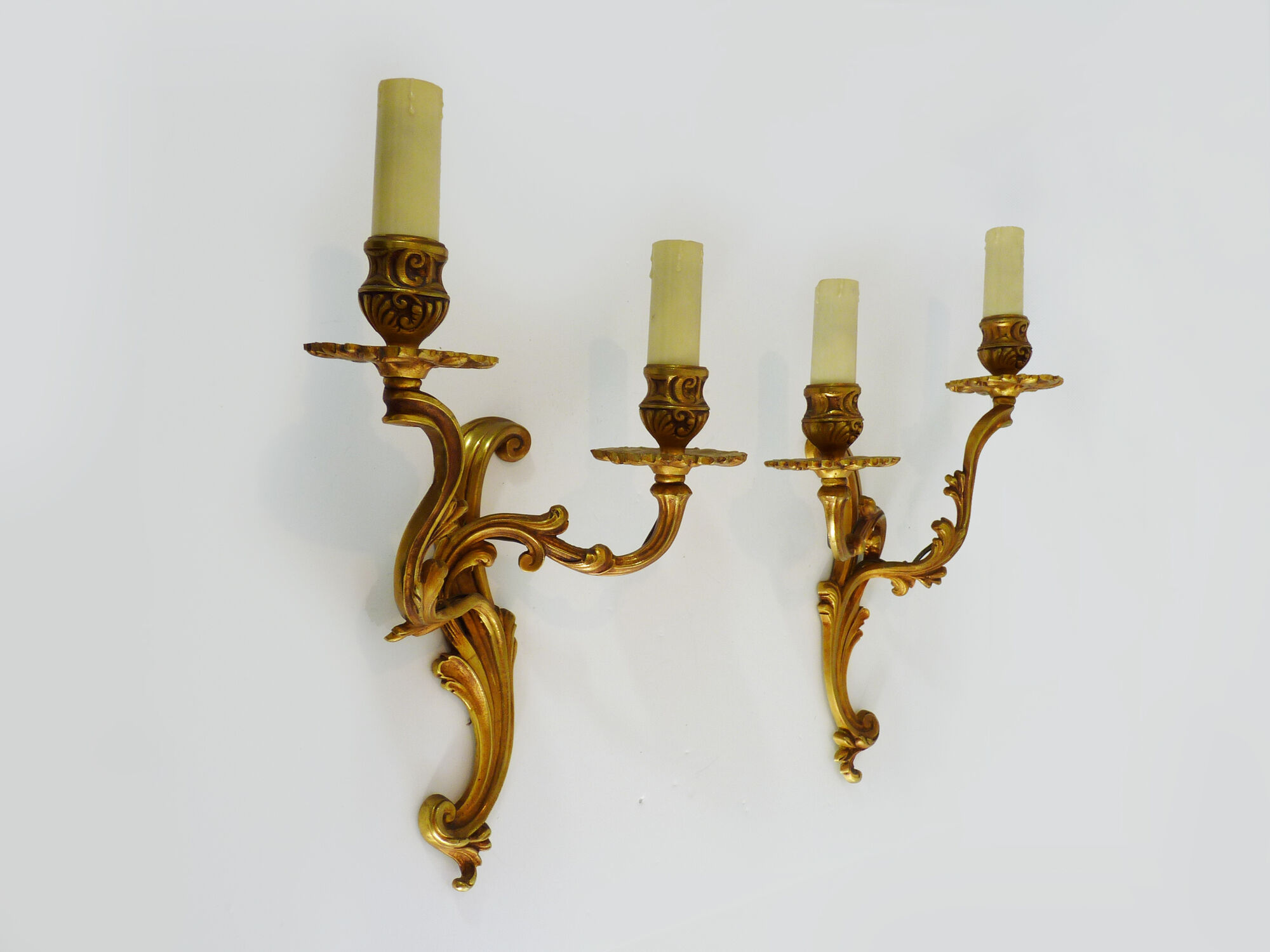 Former pair of double-light wall light in bronze or brass. Year 50 60
