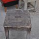 Vintage brown workshop stool in solid pine, 1940s industrial style.