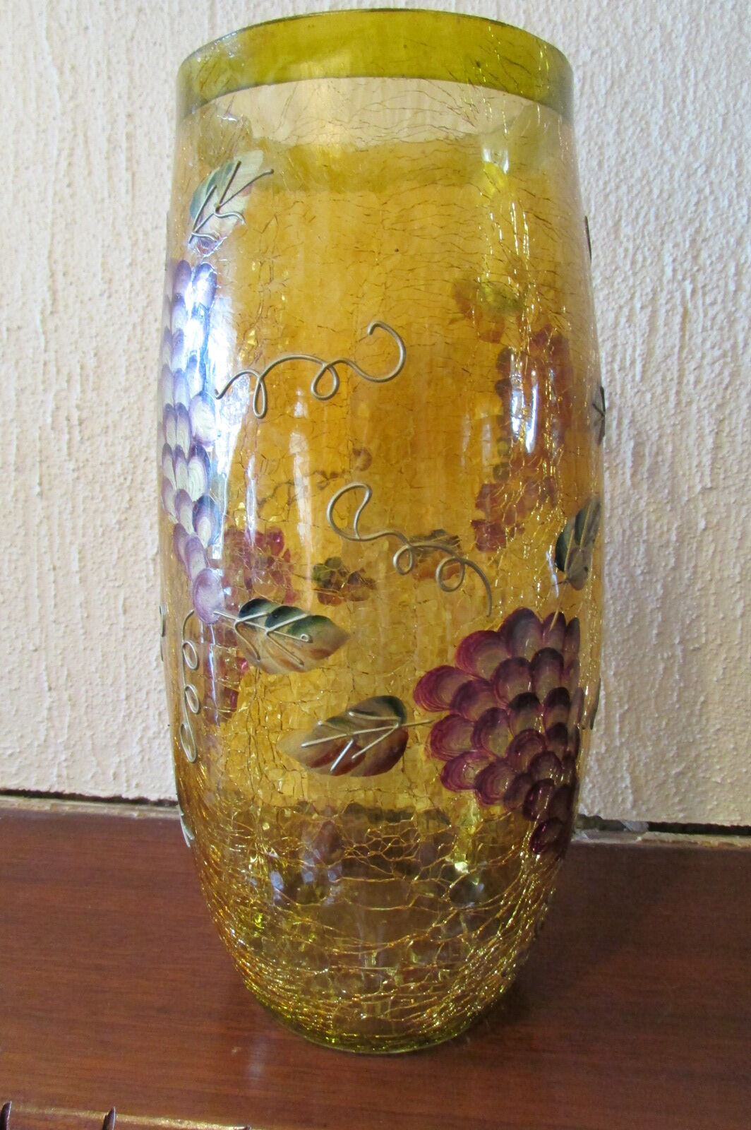 Yellow glass vase, cracked paint, grape motifs