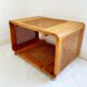 Table basse cannée à roulettes