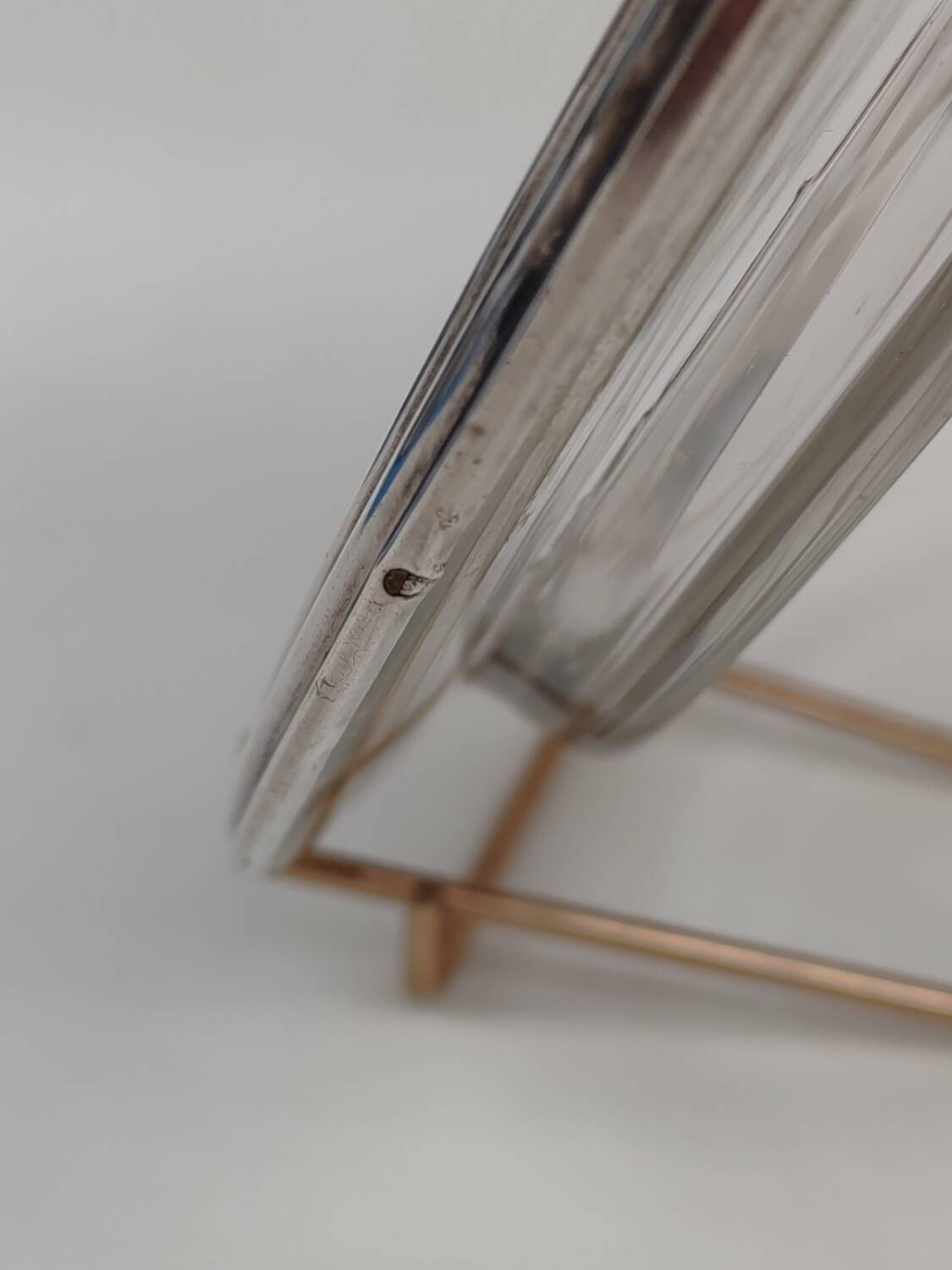 Cut crystal tray and solid silver rim.