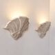 Pair of vintage geometric wall sconces in plaster, France, 1960.