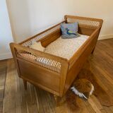 Wooden and wicker baby bed