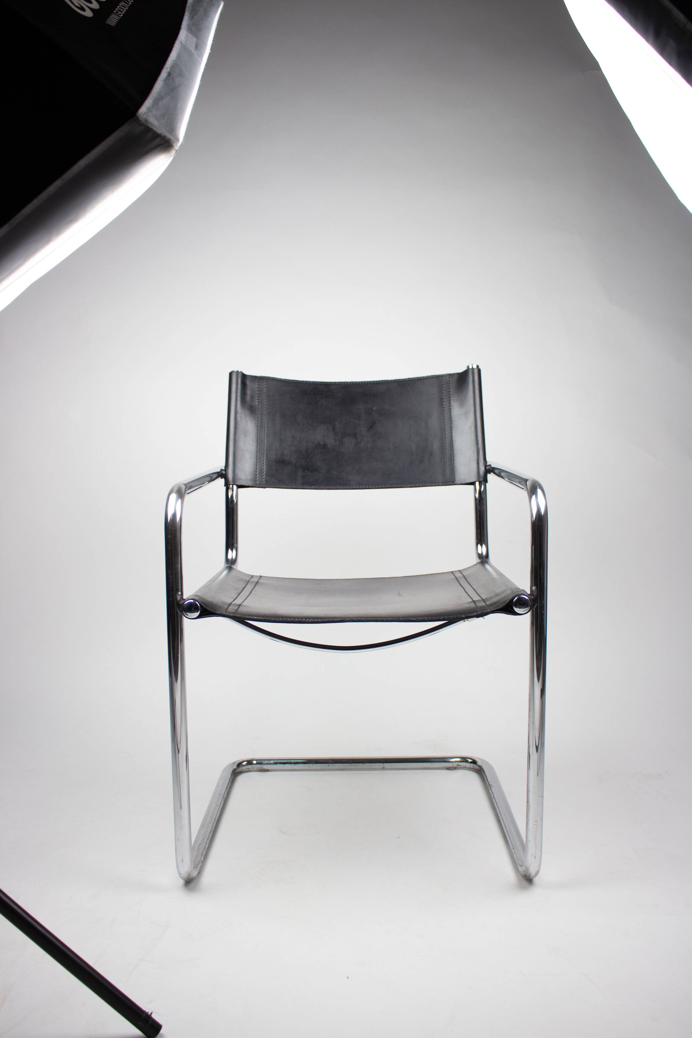 Pair of Matteo Grassi MG5 chairs in black leather and chrome