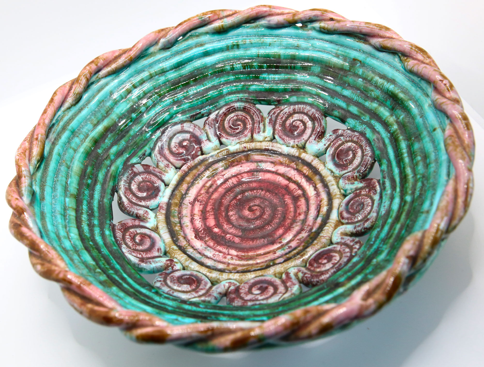 Vintage XL dish in openwork slurry with blue-green and old pink spirals