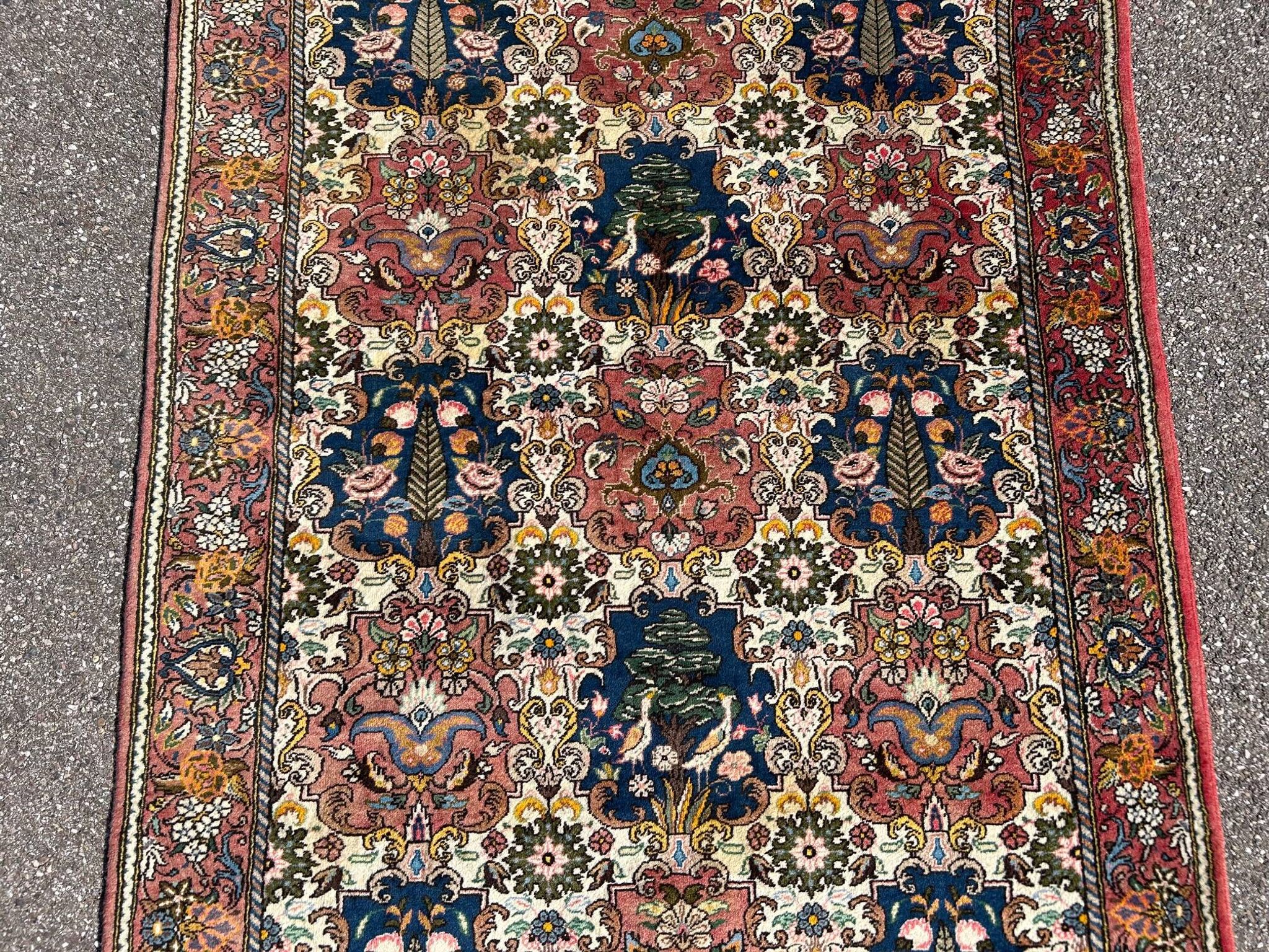 tapis d'orient à décor d'oiseaux 150/205cm