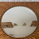 Sun mirror in gilded metal