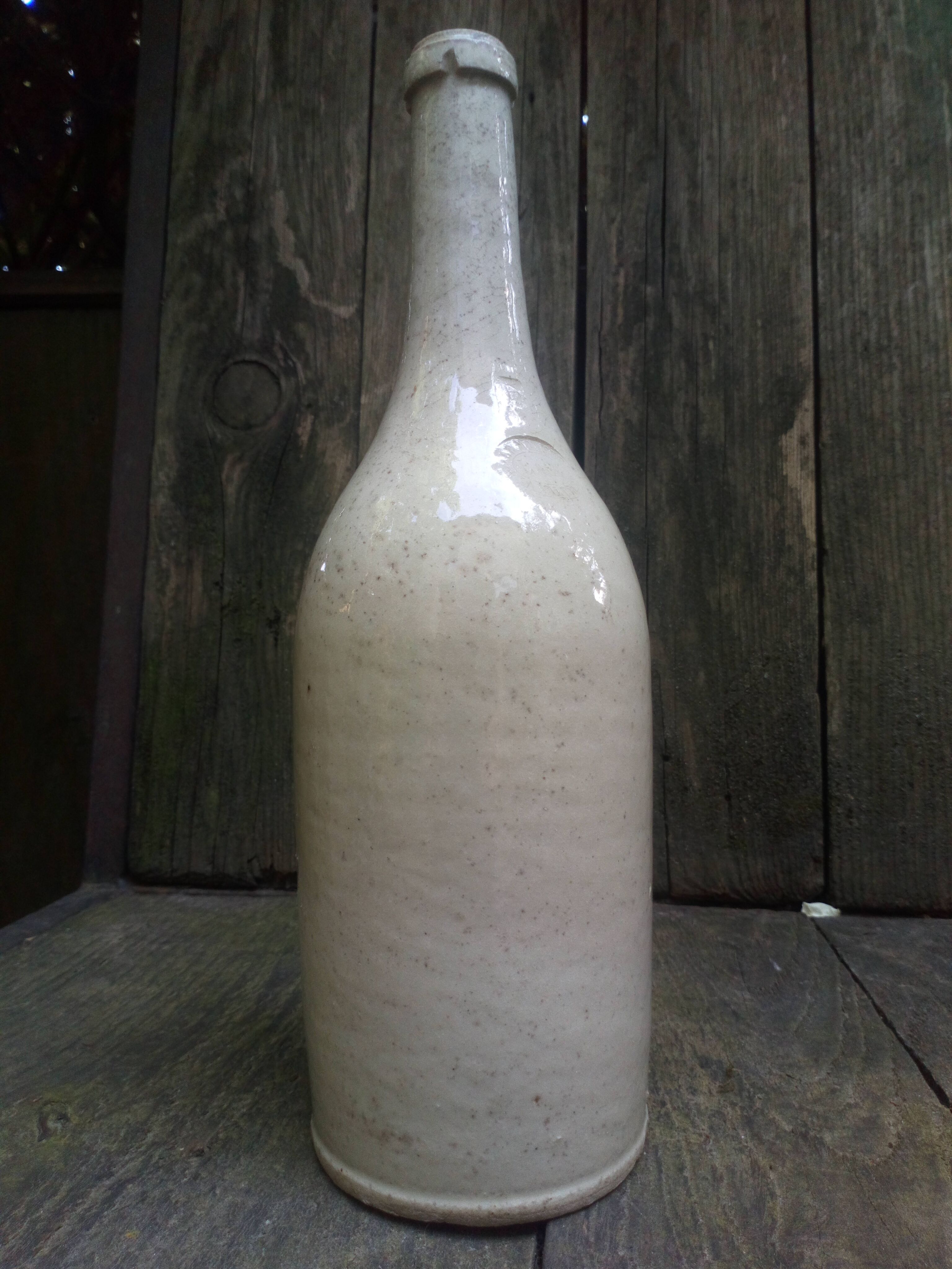 19th-century bottle in vernissée earth