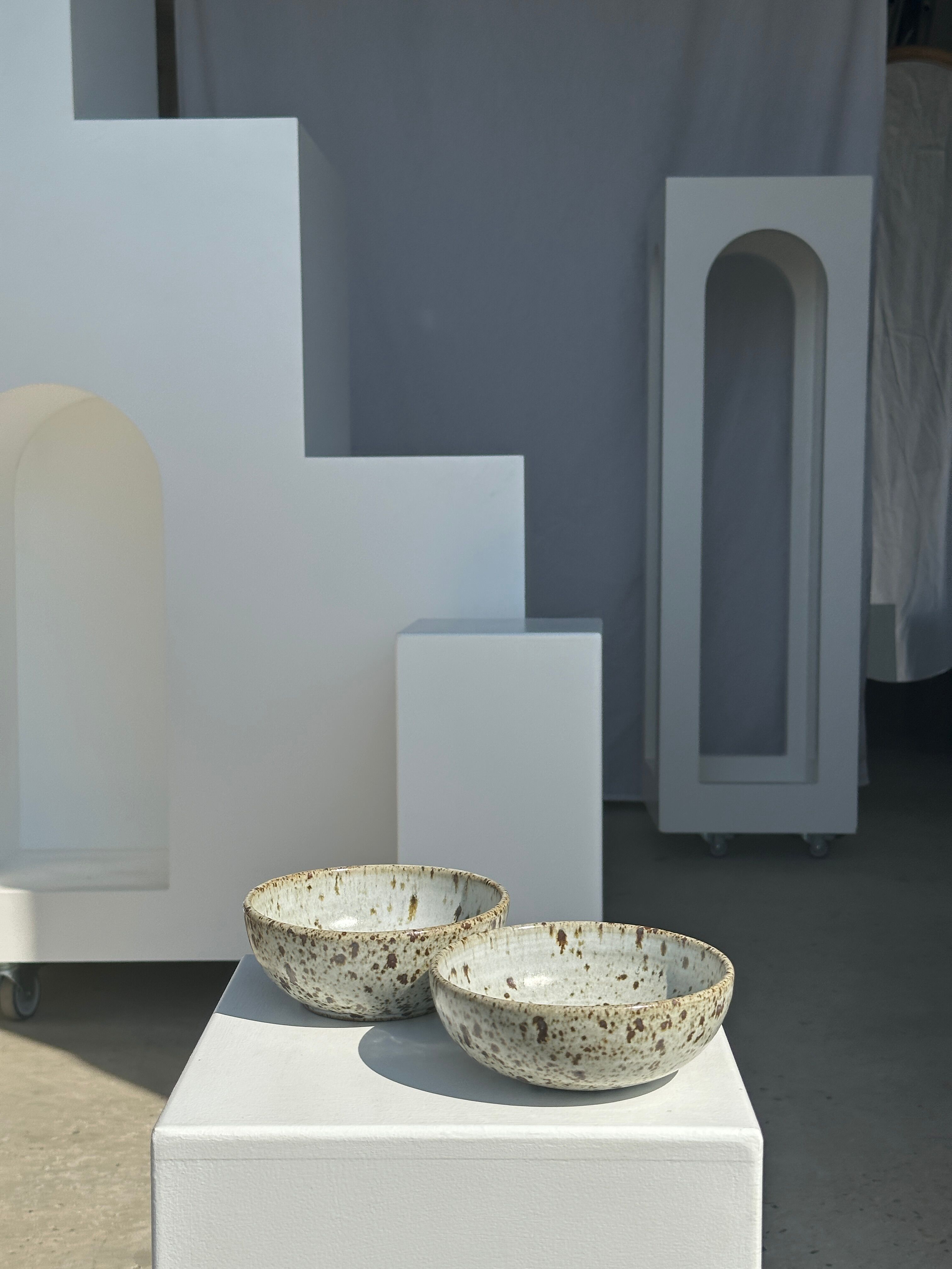 Duo of speckled ceramic bowls