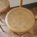 Wooden bar stools and cane