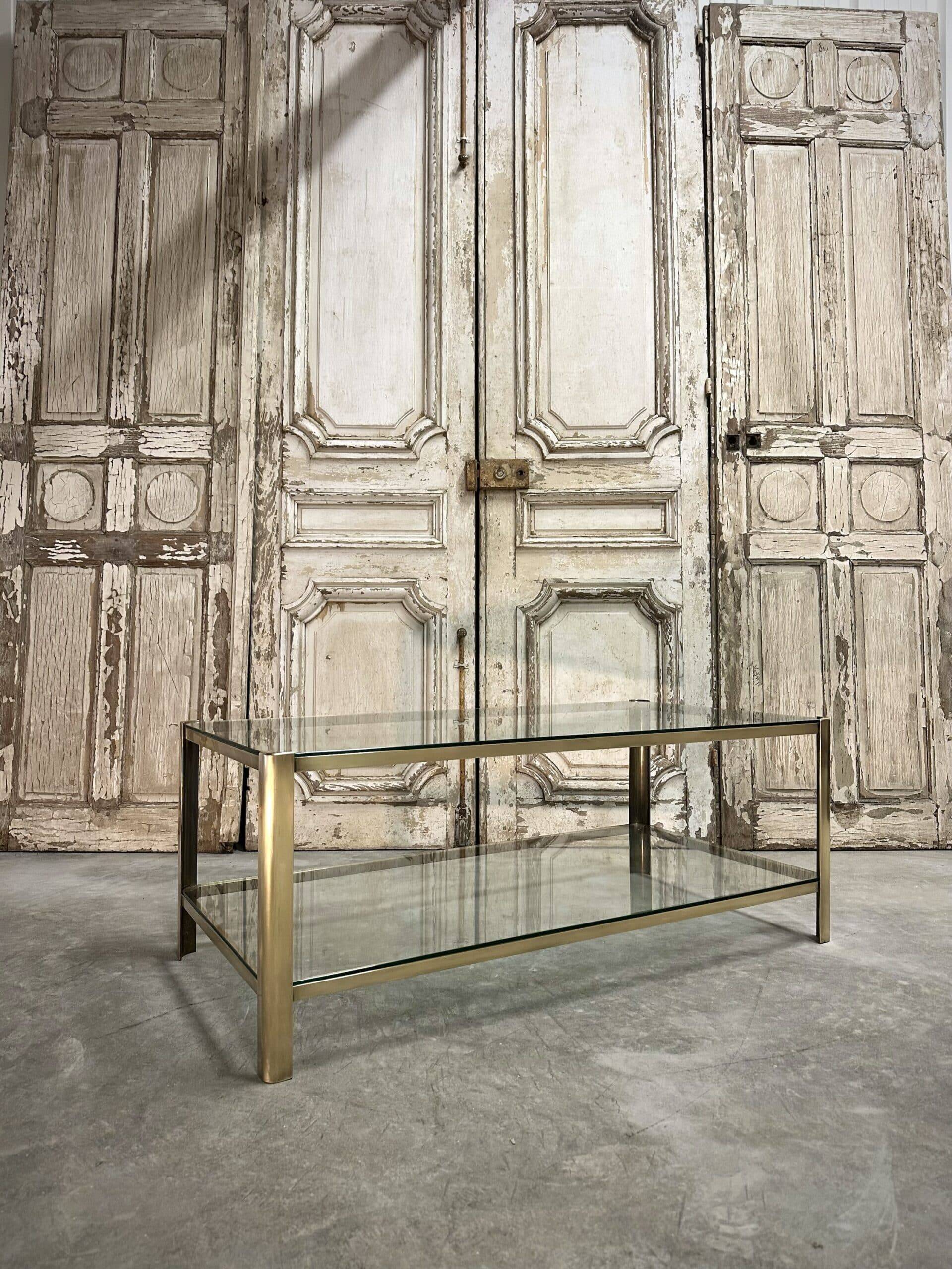 Table basse à double plateau en bronze attribuée à Jacques Quinet