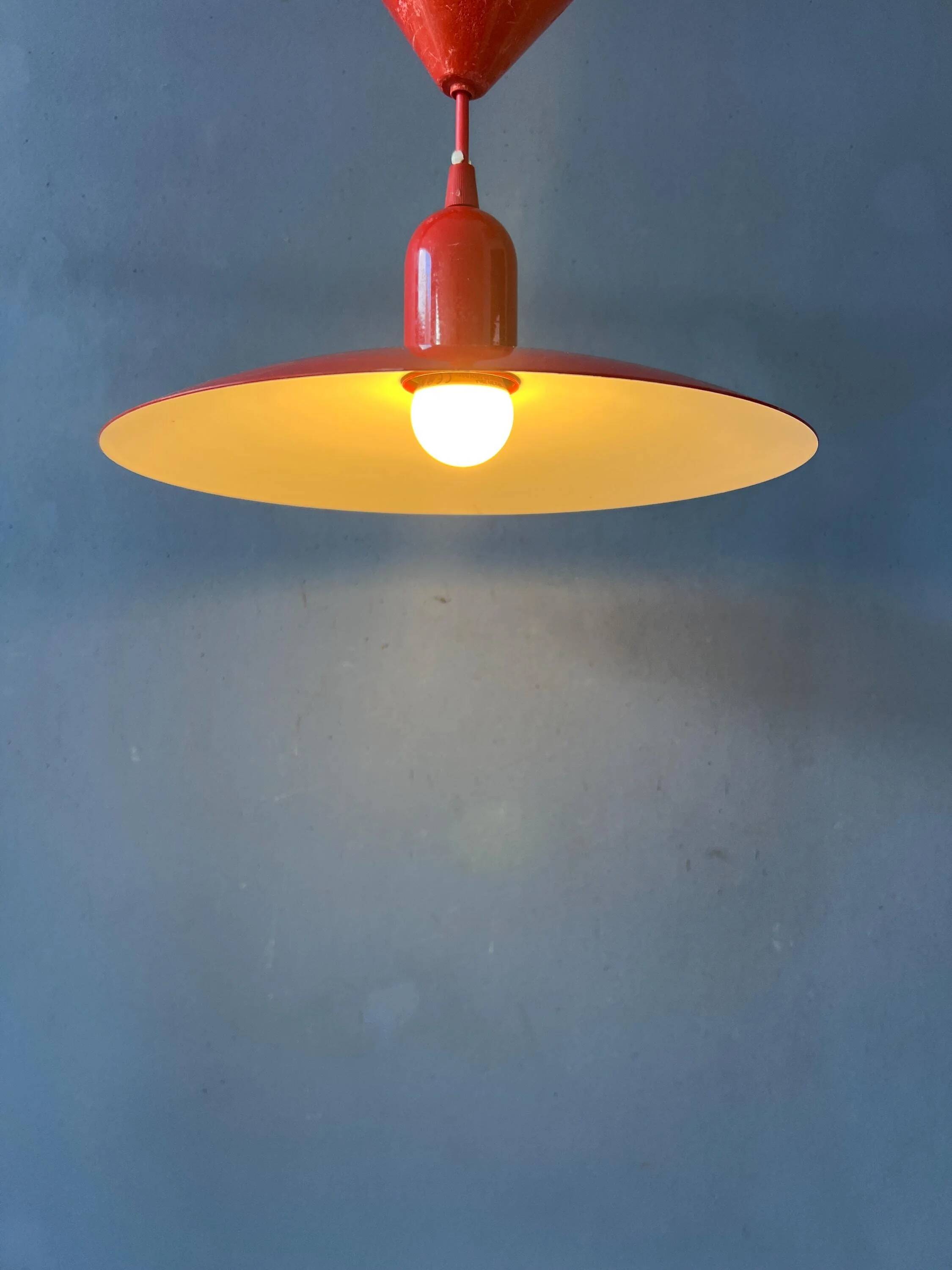 Small vintage Space Age suspension in red metal.