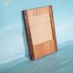 Minimalist Scandinavian mirror in teak with a vintage design.