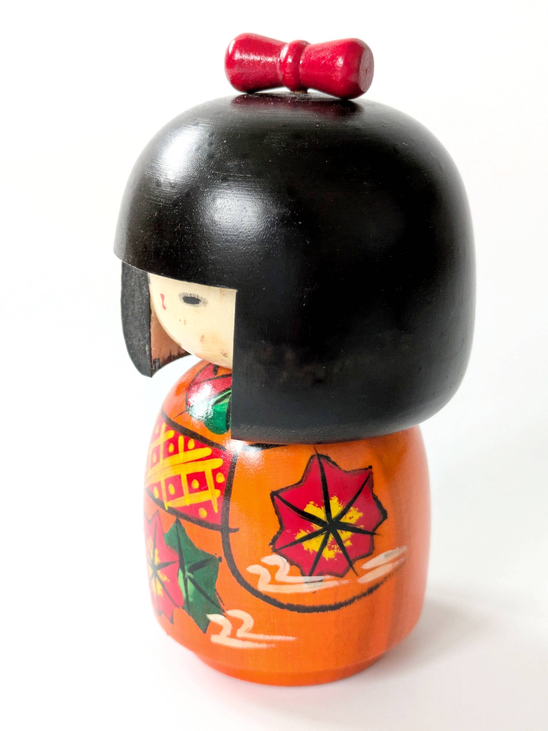 Vintage Japanese kokeshi doll, hand-painted wood