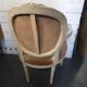 Louis XVI style bergère armchair in patinated wood