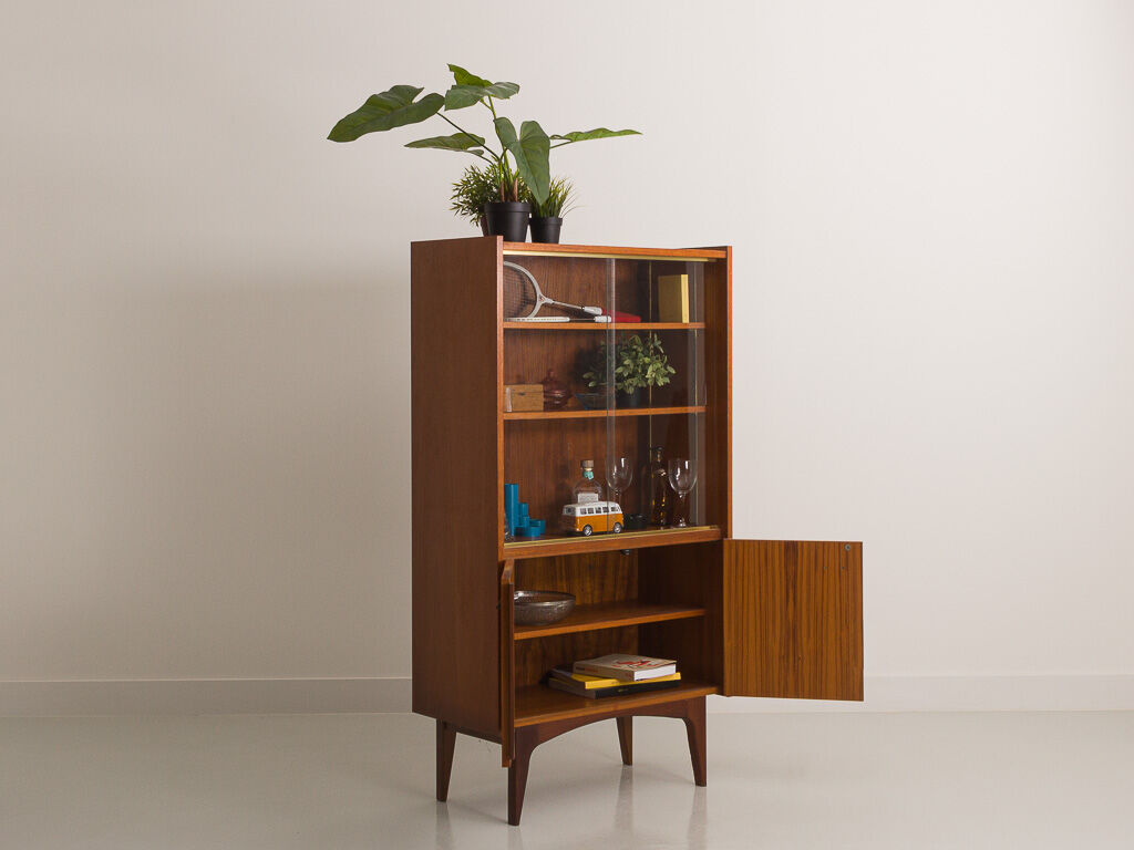 Teak sideboard consisting of a showcase with shelves and a double door