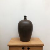Ancient varnished sandstone jug