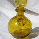 Bottle in bubbled glass of biot