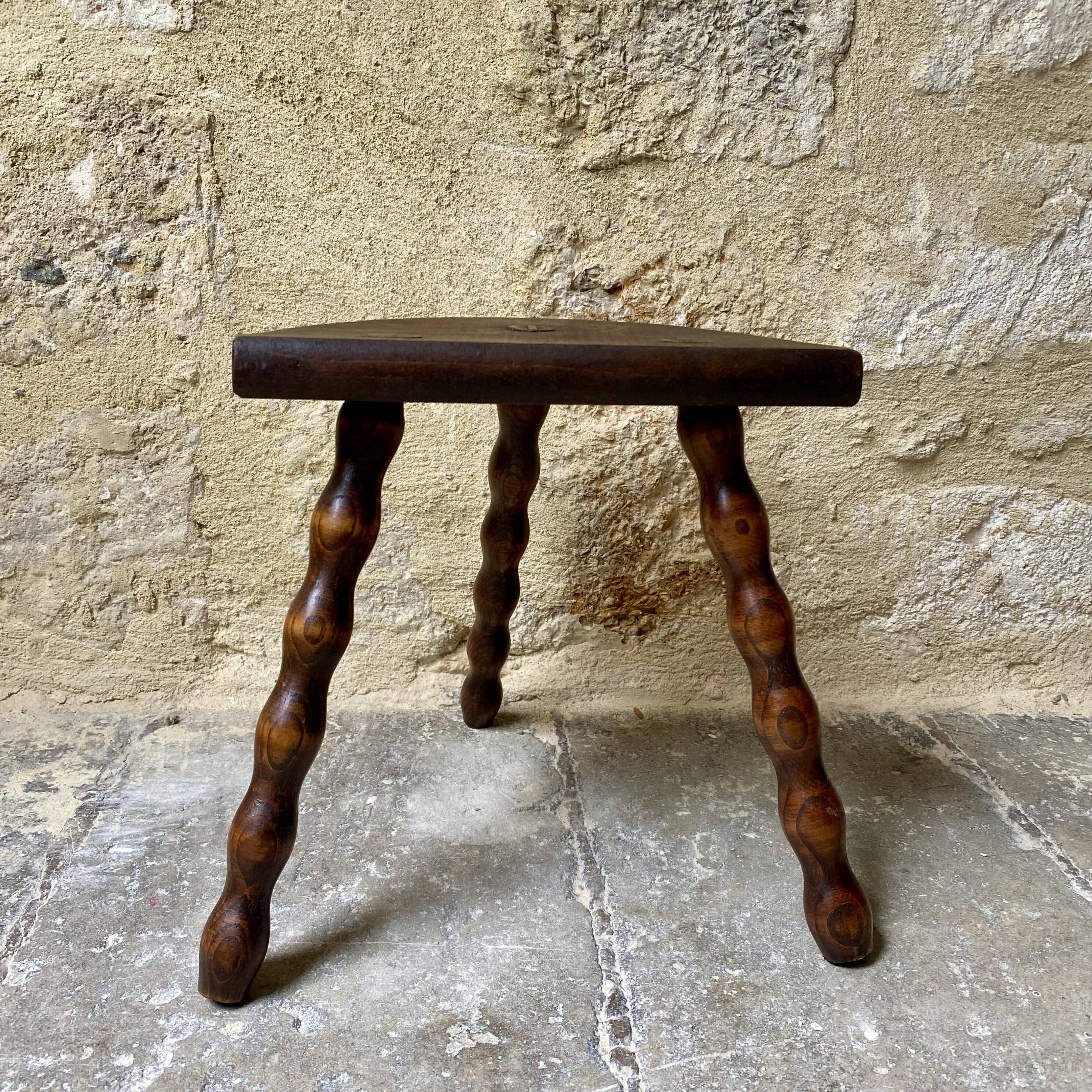 Turned wooden tripod stool