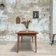 Vintage farmhouse table with spindle legs.