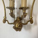 Wall lamp in Louis XV style in brass, shell decoration.