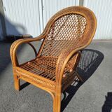 Vintage rattan armchair Mélarti (Emmanuelle style) + custom cushion