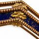 Octagonal wall mirror in cobalt blue eglomisé glass and gilded wood, Spain.