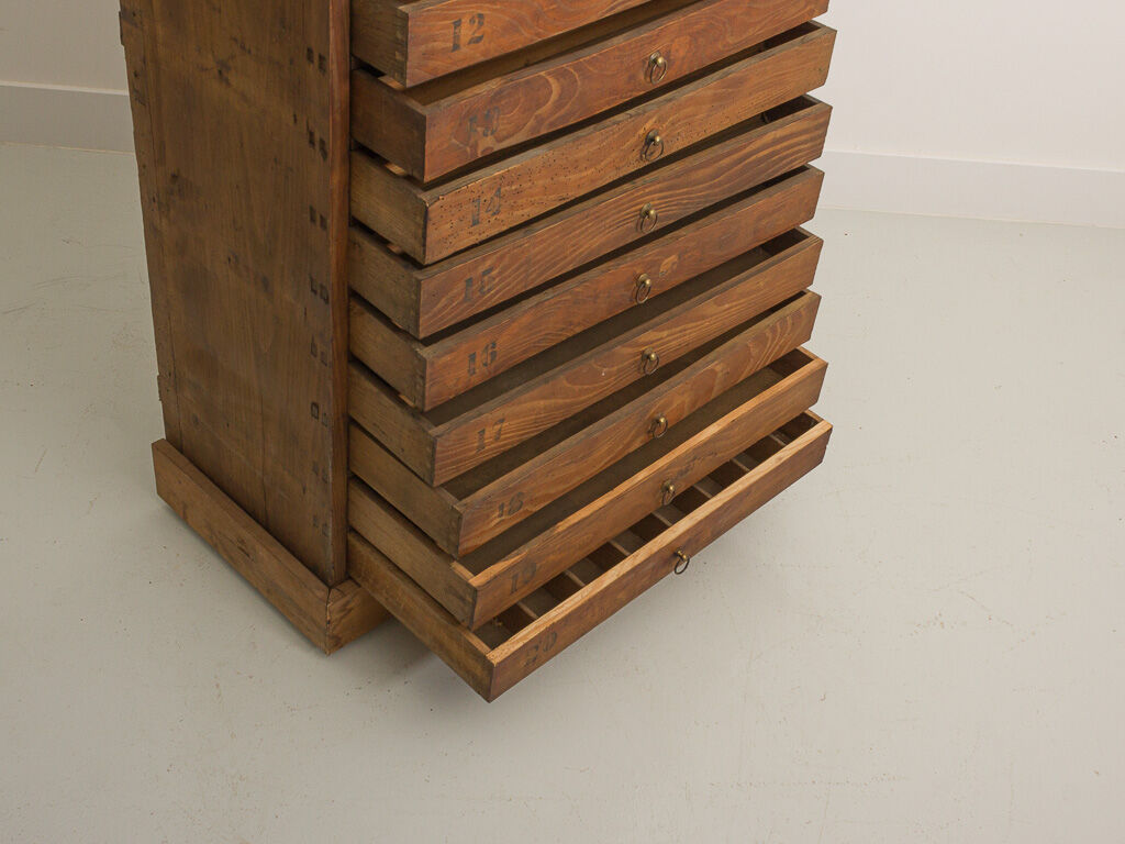 Solid wood column equipped with 20 drawers