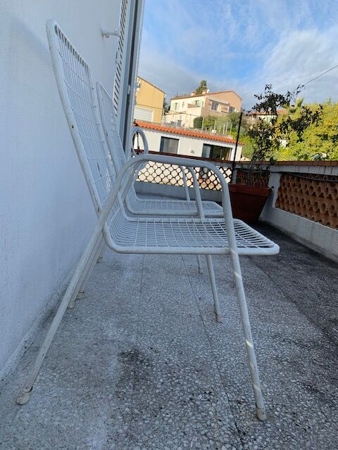 Lot of two metal chairs