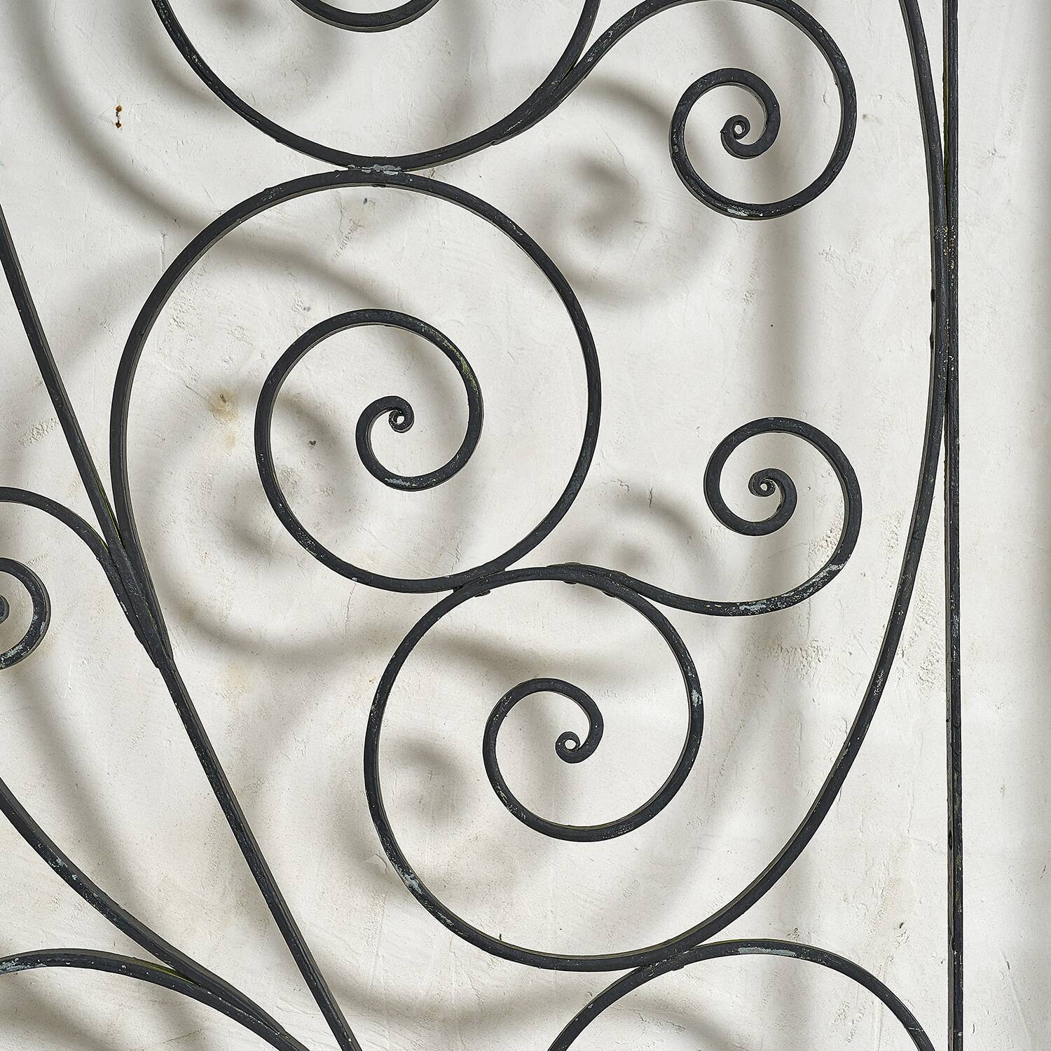 Arched wrought iron gate