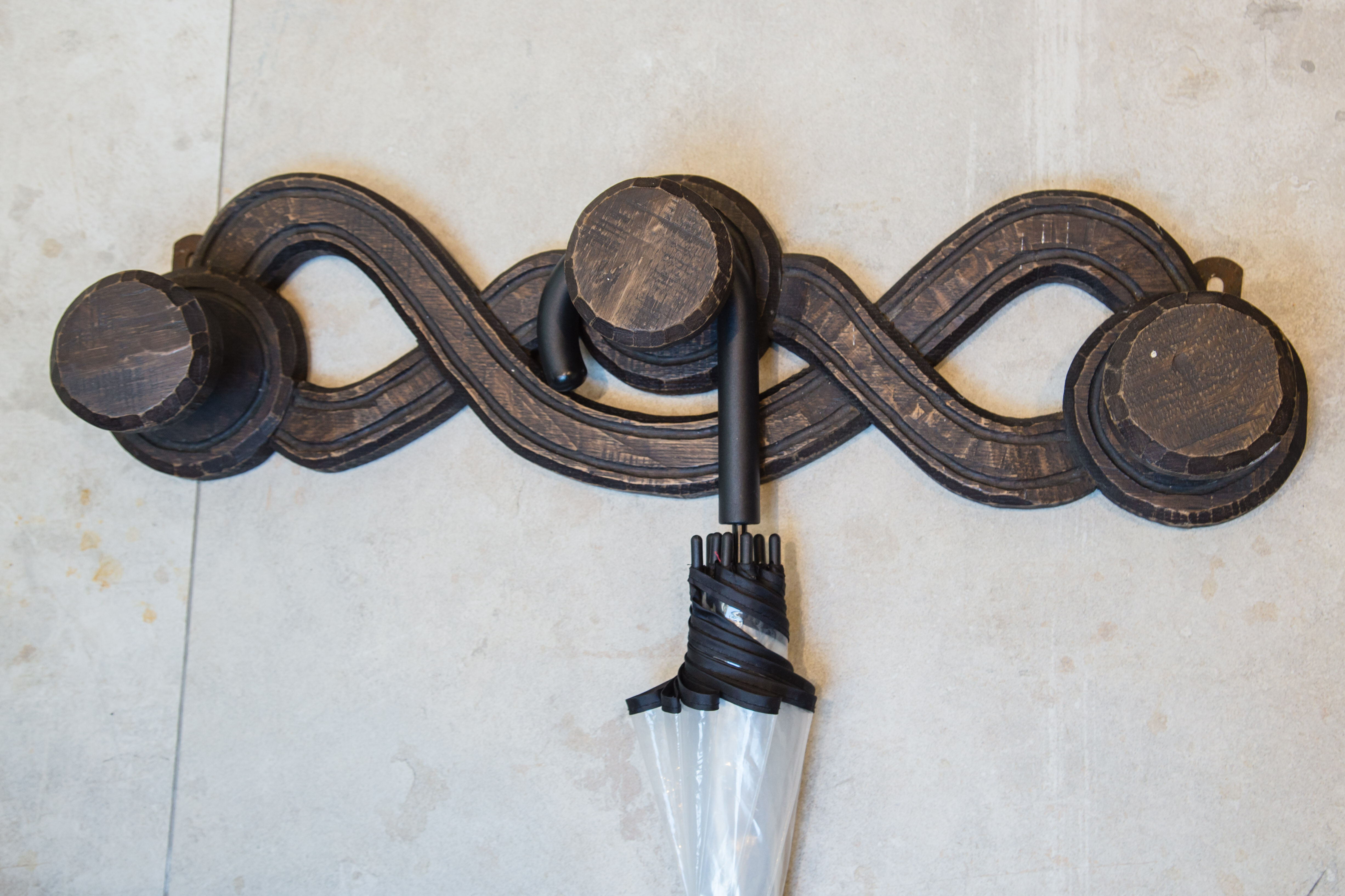 Wooden wall coat rack