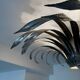 Silver wrought iron sunburst wall light from the 1960s.