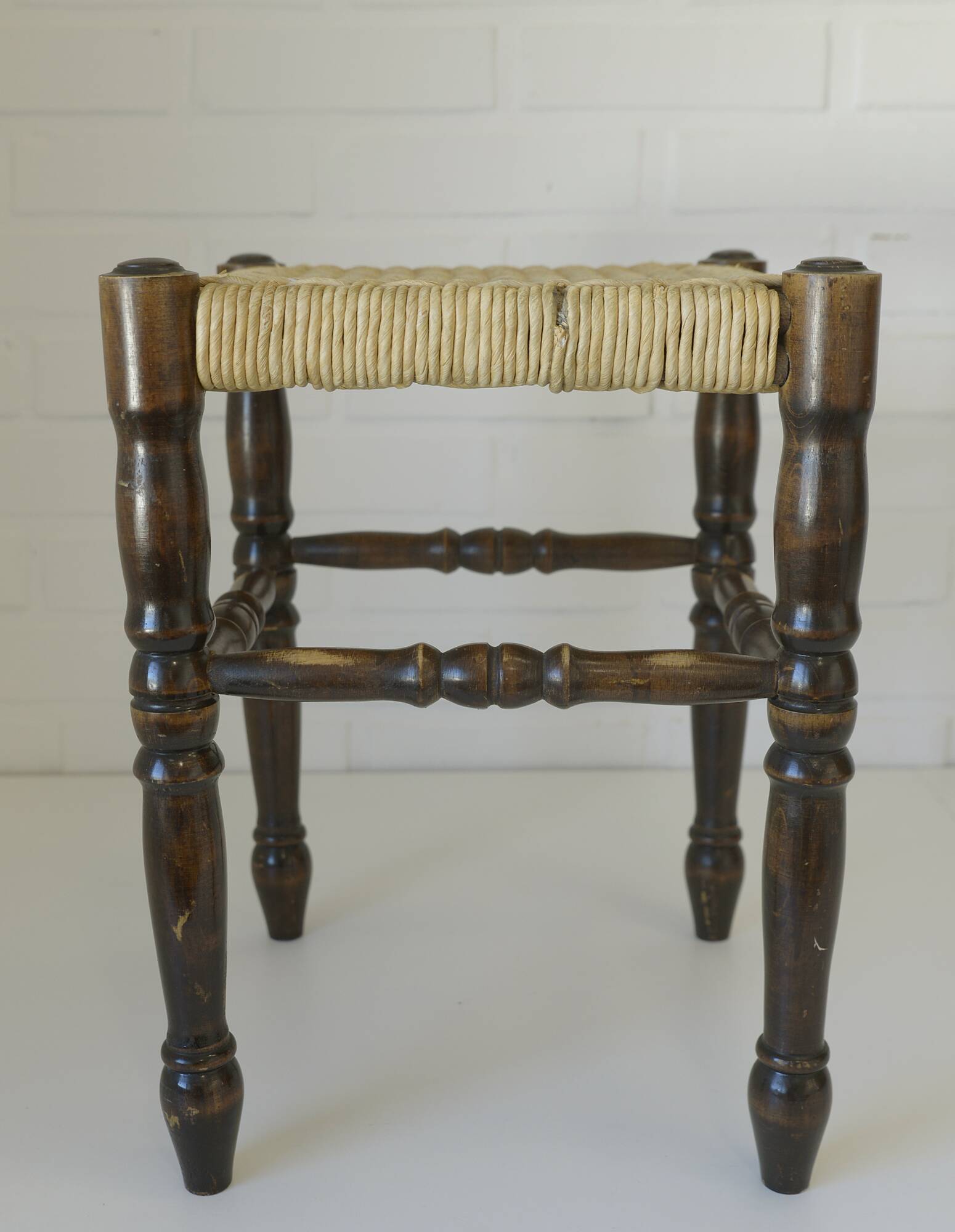 Vintage rustic stool, wooden ottoman footstool, wicker bench from the 1960