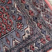 Handmade vintage Uzbek Bukhara rug 64cm x 94cm 1950s