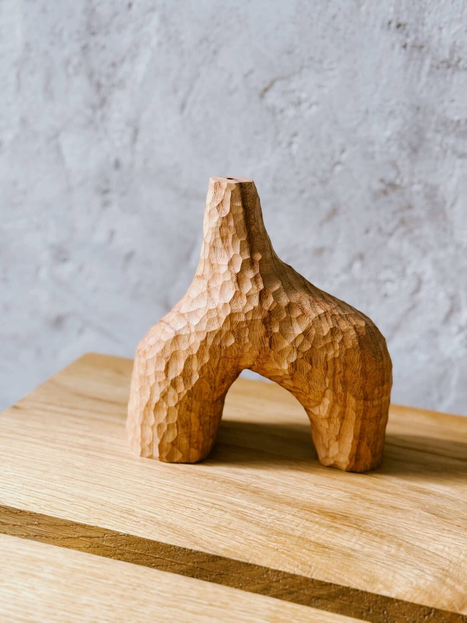 Hand-carved soliflore vase in solid chestnut wood.