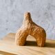 Hand-carved soliflore vase in solid chestnut wood.