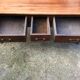 Old farmhouse table with cherry and chestnut panels with 3 drawers.